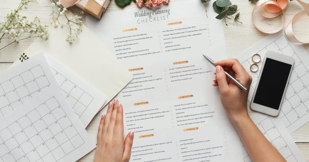 Bride checking off items on a wedding planning checklist