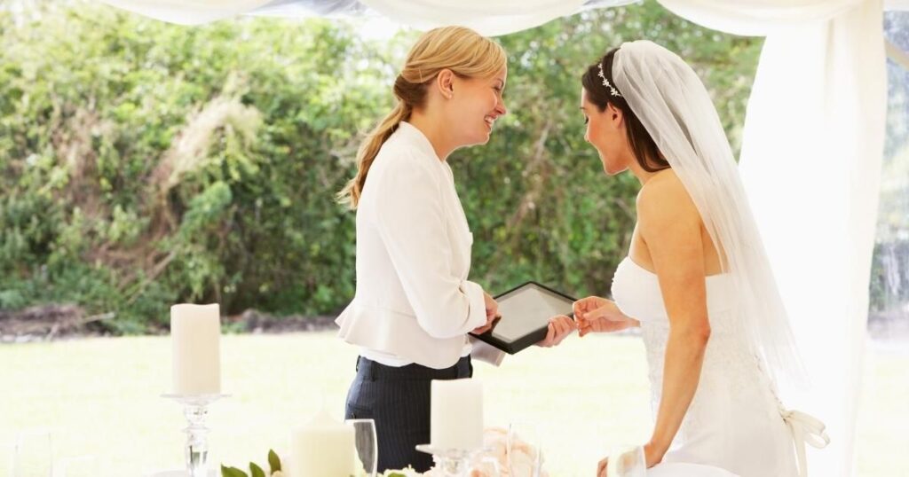 Wedding planner going over details with a bride