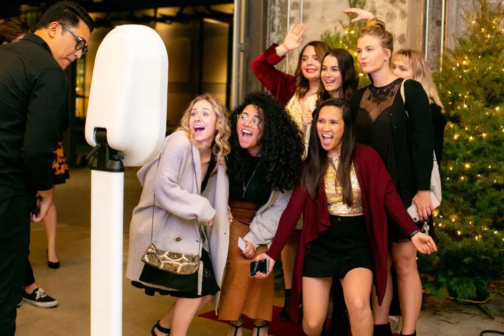 A group of women posing for a Chicagoland Photo Booth